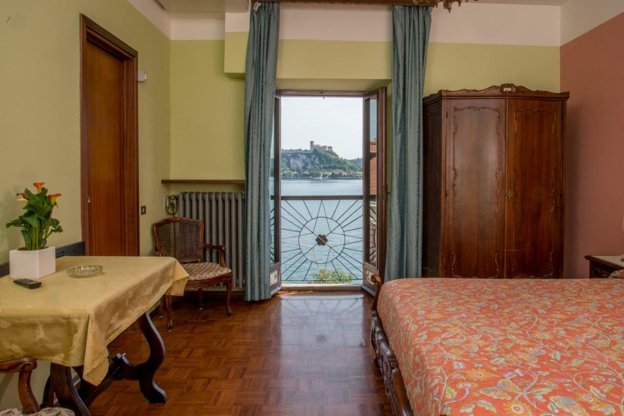 Hotel Florida Arona Bagian luar foto
