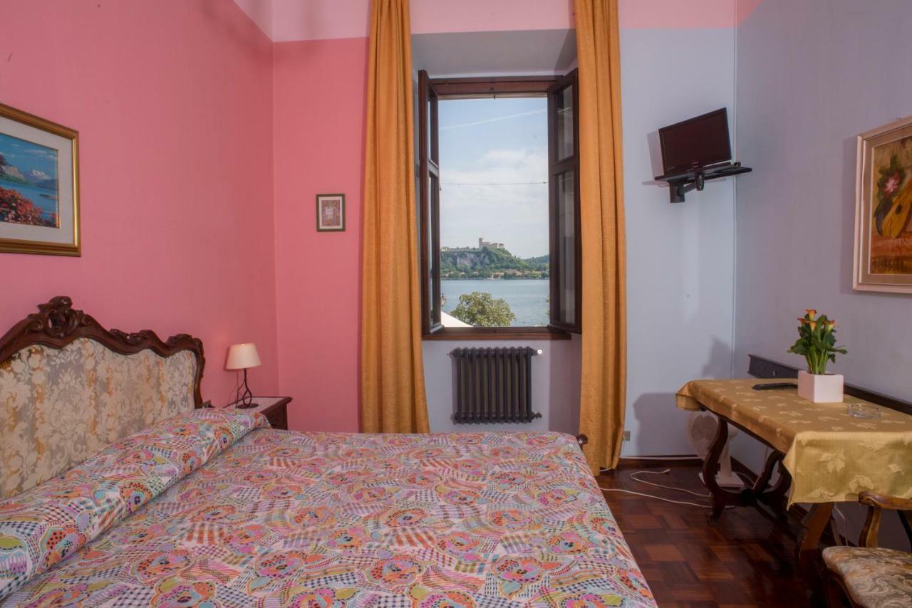 Hotel Florida Arona Bagian luar foto