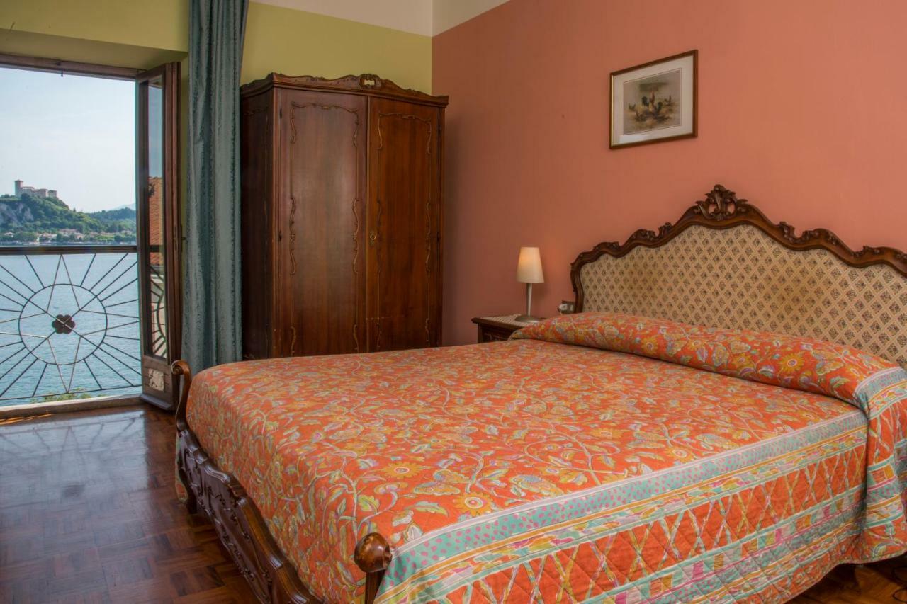 Hotel Florida Arona Bagian luar foto